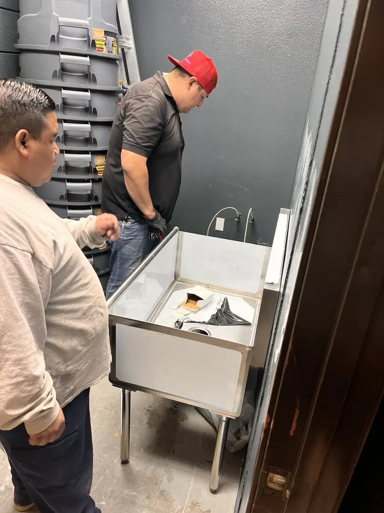 Commercial plumbing and sink installation in Alliance